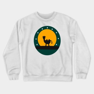 Camel walking on a wood branch at sunset in the Egyptian desert Crewneck Sweatshirt